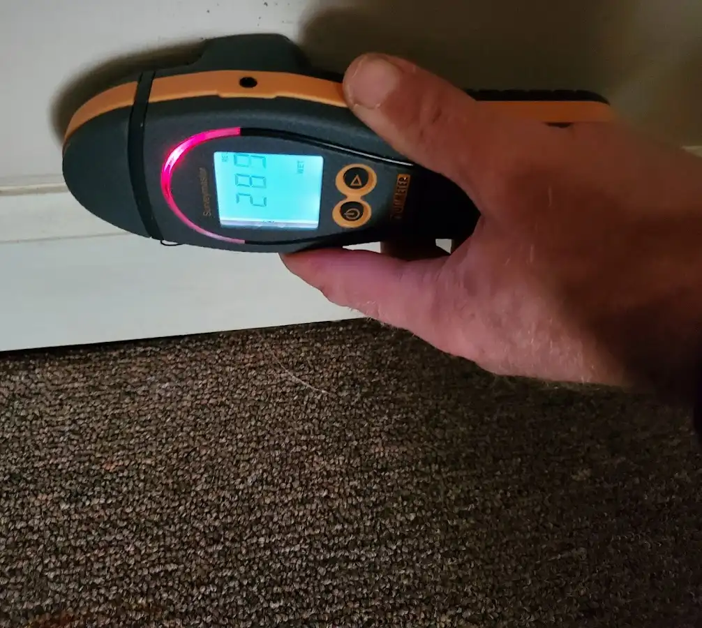 Moisture detection at baseboard during Burst Pipe Cleanup in Kettering